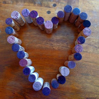 corks lined up in the shape of a heart